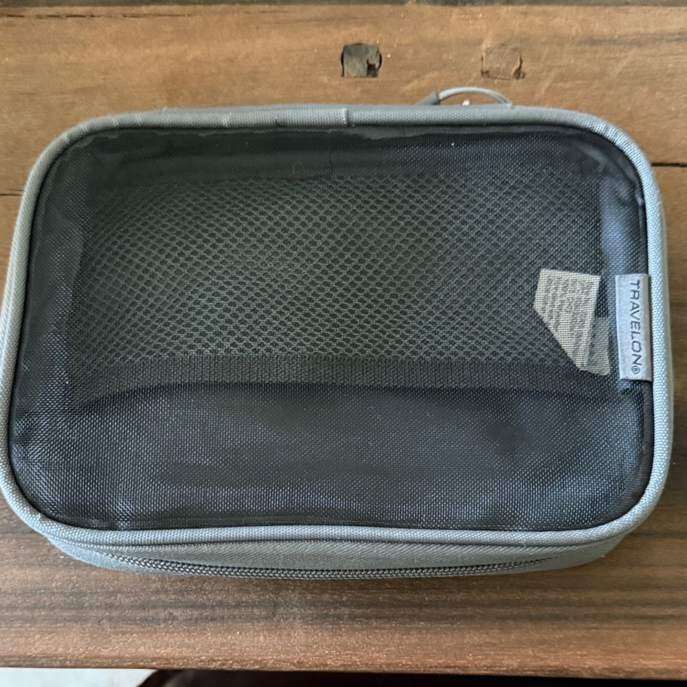 Good Condition Mesh front Travel Case by Travelon